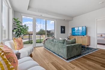 a living room with a couch and a tv